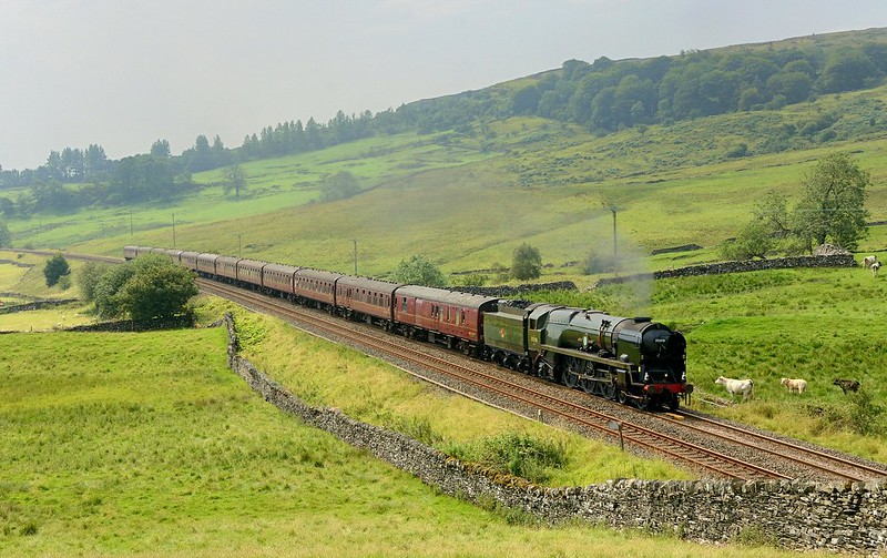 In very hot and humid conditions 
 and running an hour late after a water stop at Hellifield 35018 British India Line heads north with the Dalesman from Chester
Copyright David Price
No unauthorised use