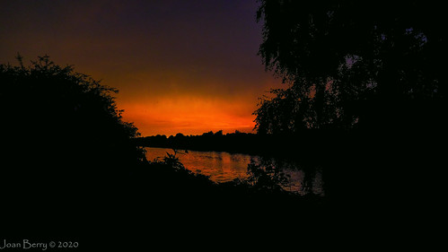 sunset storm red orange moore manchestershipcanal nightscene fujifilmxt4 fujifilm warrington water clouds
