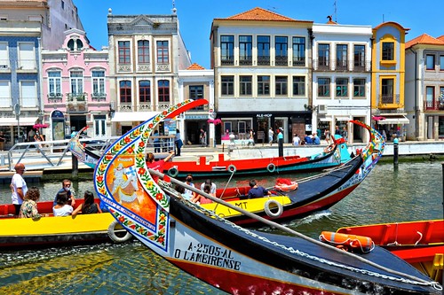 aveiro geo:lat=4064120523 geo:lon=865497132 geotagged portugal prt boat tourism travel river architecture europe moliceiro portuguese transportation canal traditional city cityscape transport landmark building colorful art vintage sail town urban color gondola house vessel tourist culture ship decoration water picturesque landscape typical decorative trip historical embankment cruise gondolier romantic channel dock detail sightseeing sky paint symbol insta
