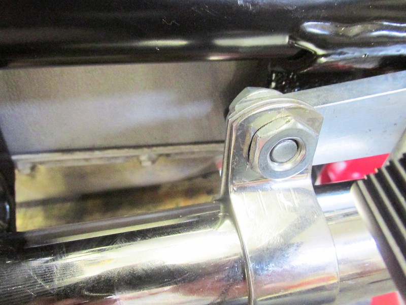 Left Side Muffler Bracket Mounted On Front Hole Of Brown's Side Stand