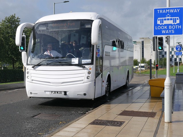 Alba Coaches of Newbridge Volvo B9R Caetano Levante FJ11MJU, on rail replacement duty, at Edinburgh Park on 21 August 2020.