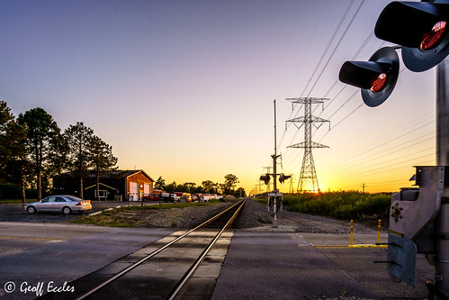 track tamron rail sunset sony flat pylons railroadcrossing empty train electricity illinois traintracks deserted skyline railroadlights railroad