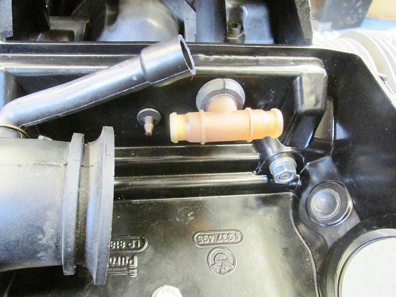 Crankcase Breather Tee Installed In Grommet Of Breather Hose
