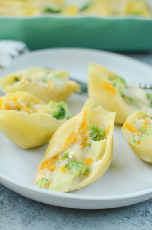 Cheesy Chicken Broccoli Stuffed Shells - pasta shells filled with chicken, broccoli, cheese, and alfredo sauce! A kid favorite and so easy!