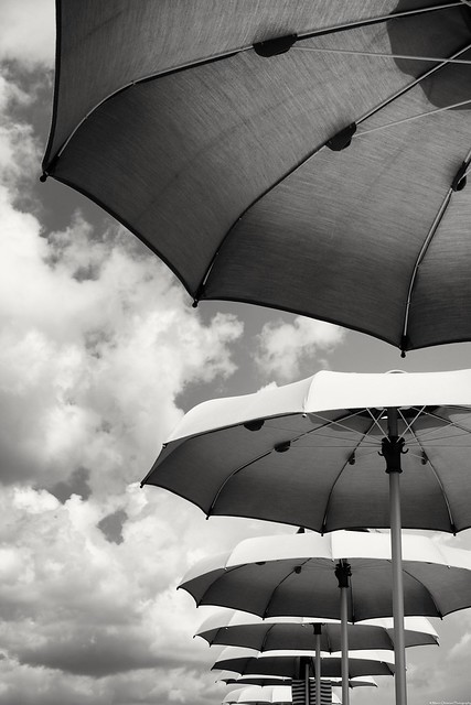 Under umbrellas