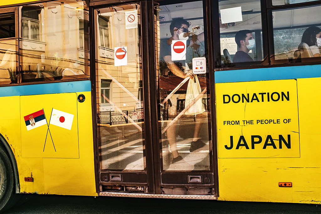 DONATION FROM THE PEOPLE OF JAPAN on side of bus on 8-28-20--Belgrade