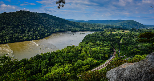 knoxville maryland unitedstates view potomac river from weverton cliffs along appalachian trail md atc us usa america tree trees forest woods green greenery water mountain heights hill hillside mountainside cliff cliffside mountaintop top train tracks