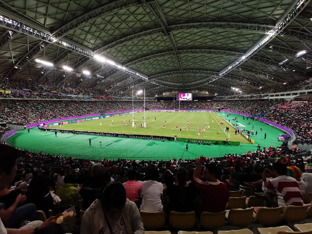 Wide-angle shot of Showa Denko Dome Oita from behind goal