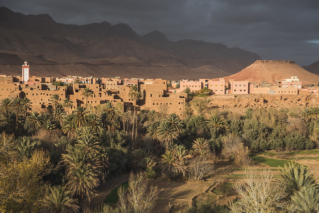 Storm brewing over a Kasbah in Tinghir, Morocco