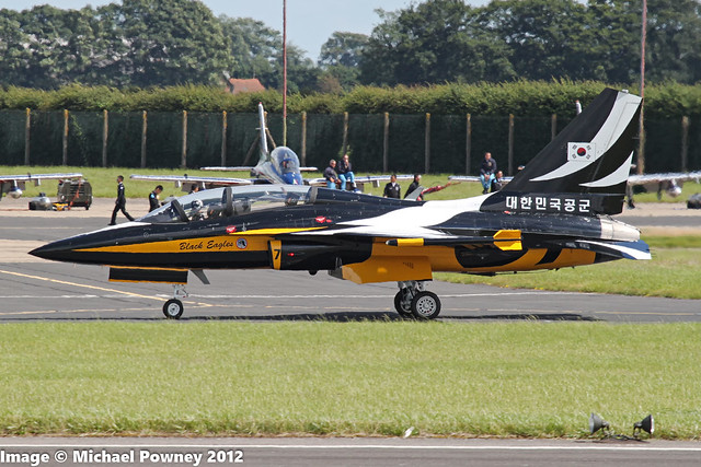 10-053 ( 'coded' 7) - KAI T-50B Republic of Korea Air Force Aerobatic Team, the Black Eagles, taxiing out to display at Waddington during the 2012 Waddington International Air Show