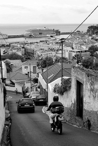 funchal madeira portugal city town urban street europe travel ocean port sea horizon view vista motorbike car hill rooftops capital monochrome black white