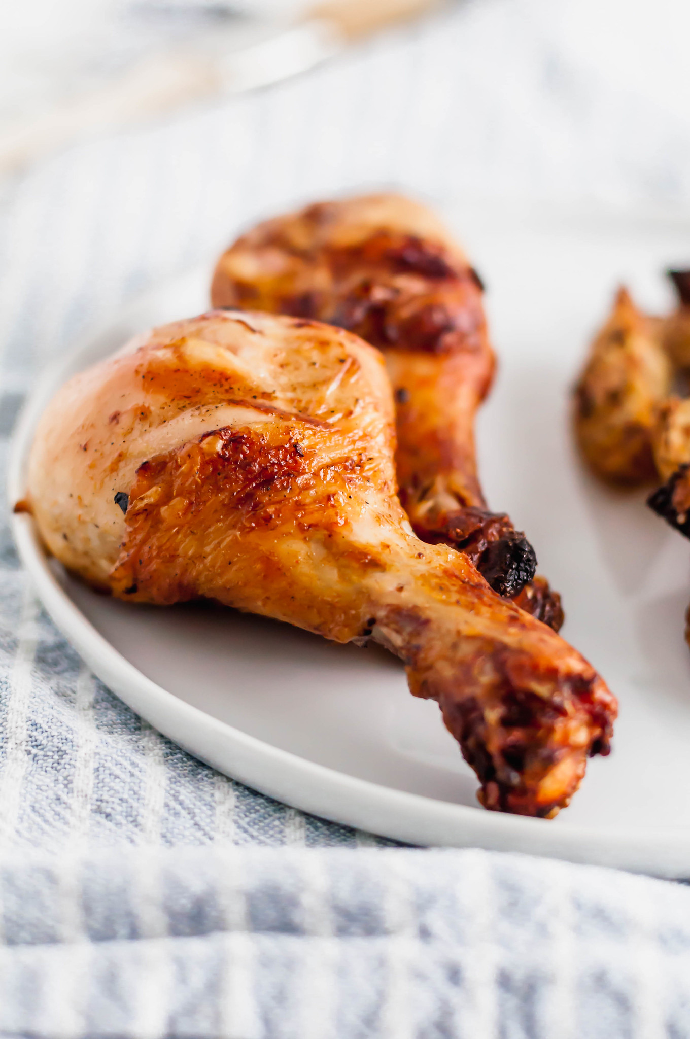 Let's hold on to summer just a bit longer with these Grilled Chicken Drumsticks. Marinated for tenderness and perfectly charred on the grill.