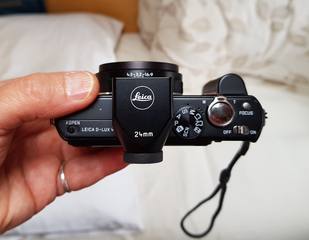 Leica D-Lux 4 with accessories, After getting the Lumix LX3…