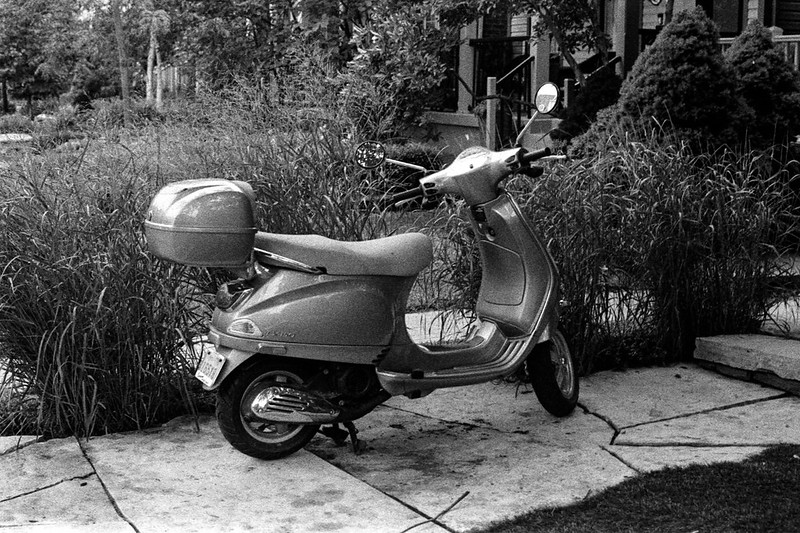 Parked Vespa on the Front Path