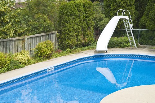 4 Benefits of Adding a Slide to Your Pool
