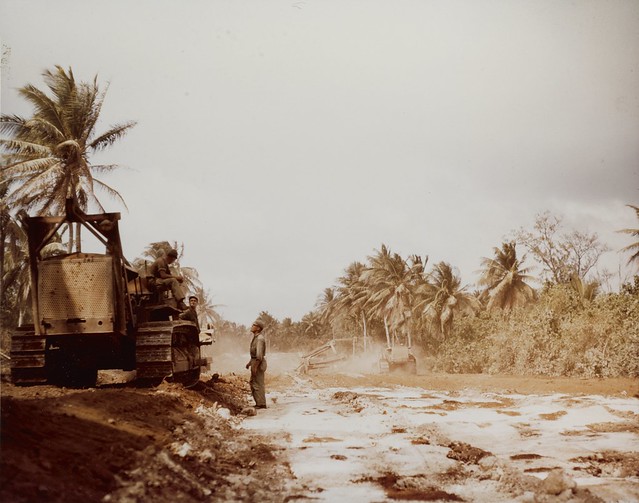 94th construction battalion Constructing a road at Talafofo, Guam,  March 8th 1945. Men by bulldozer at left are MM3c WP Dyer, CMIc J D Shearin and MMIc L M Carlson