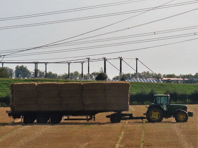 John Deere Tractor, Loaded With Straw Bales, In A Field At Fairburn North Yorkshire