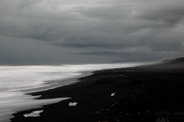 White Waves, Grey Clouds, Black Beach