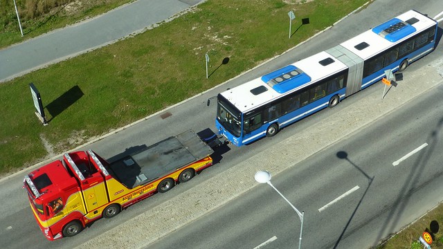 Volvo tow truck and MAN bus