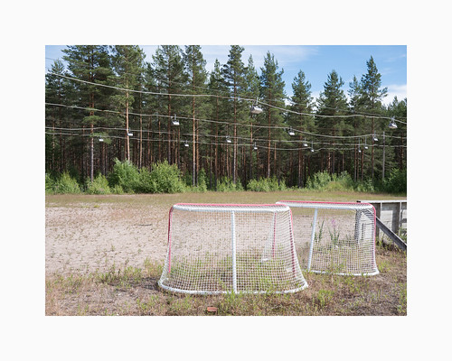 g9 panasonic20mmf17 lumsheden dalarna sweden sverige falukommun hockey field goals pines trees forest woods floodlights