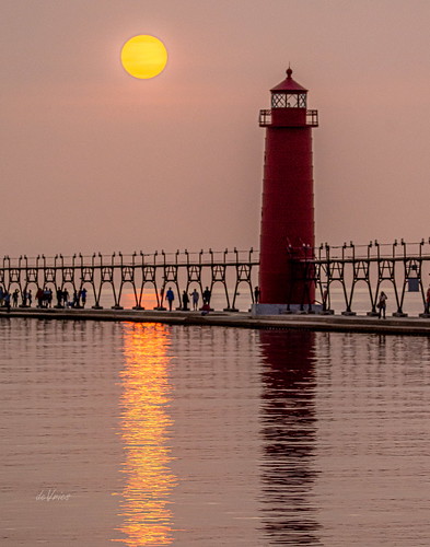 lighthouse pier catwalk sunset smoke fires people grandhaven mi michigan summer september2020 reflection orange hazy haze