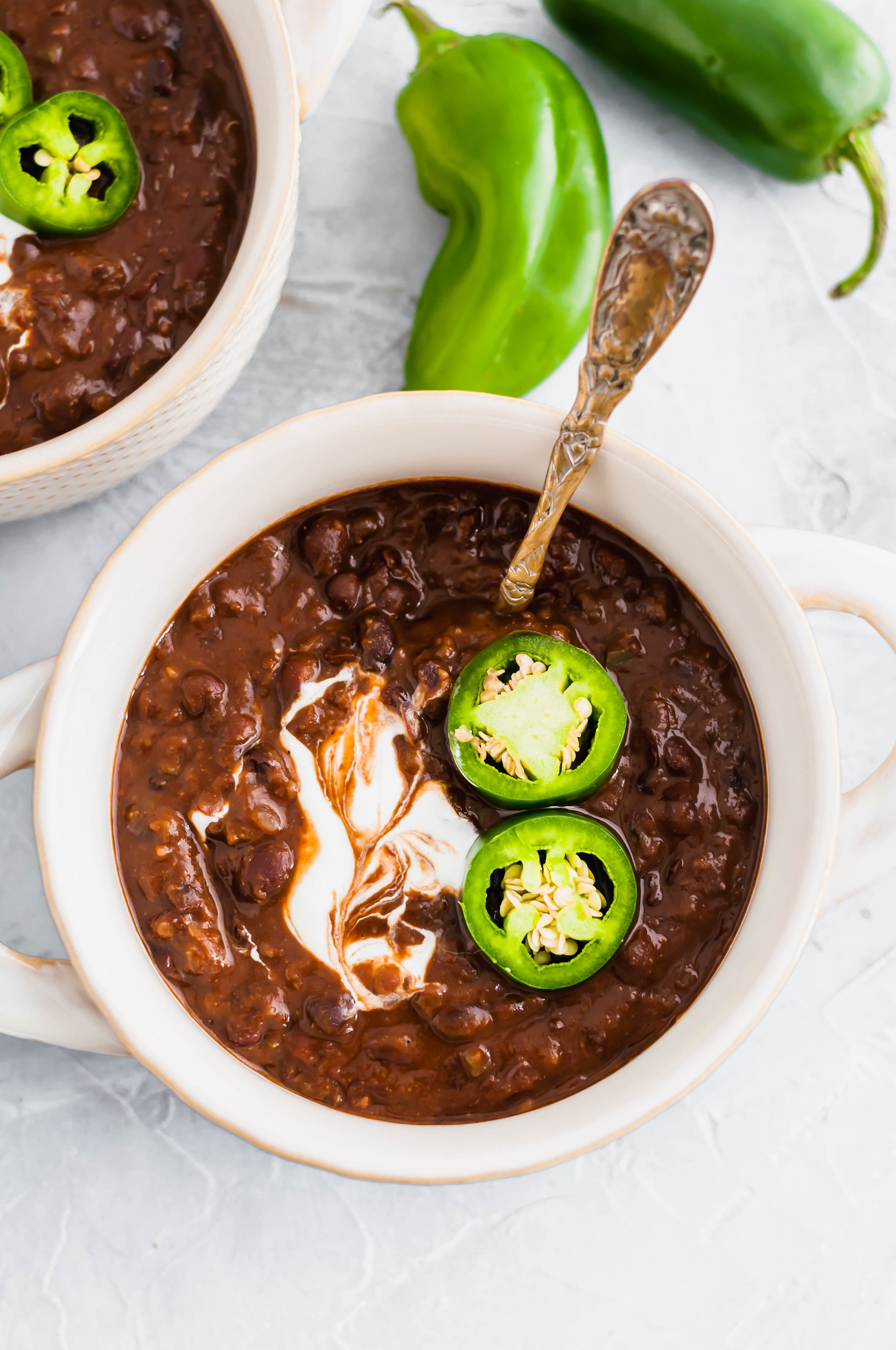 Don't let the falling temperatures bring you down. This Spicy Black Bean Soup is just what you this fall and winter to keep you warm and cozy.