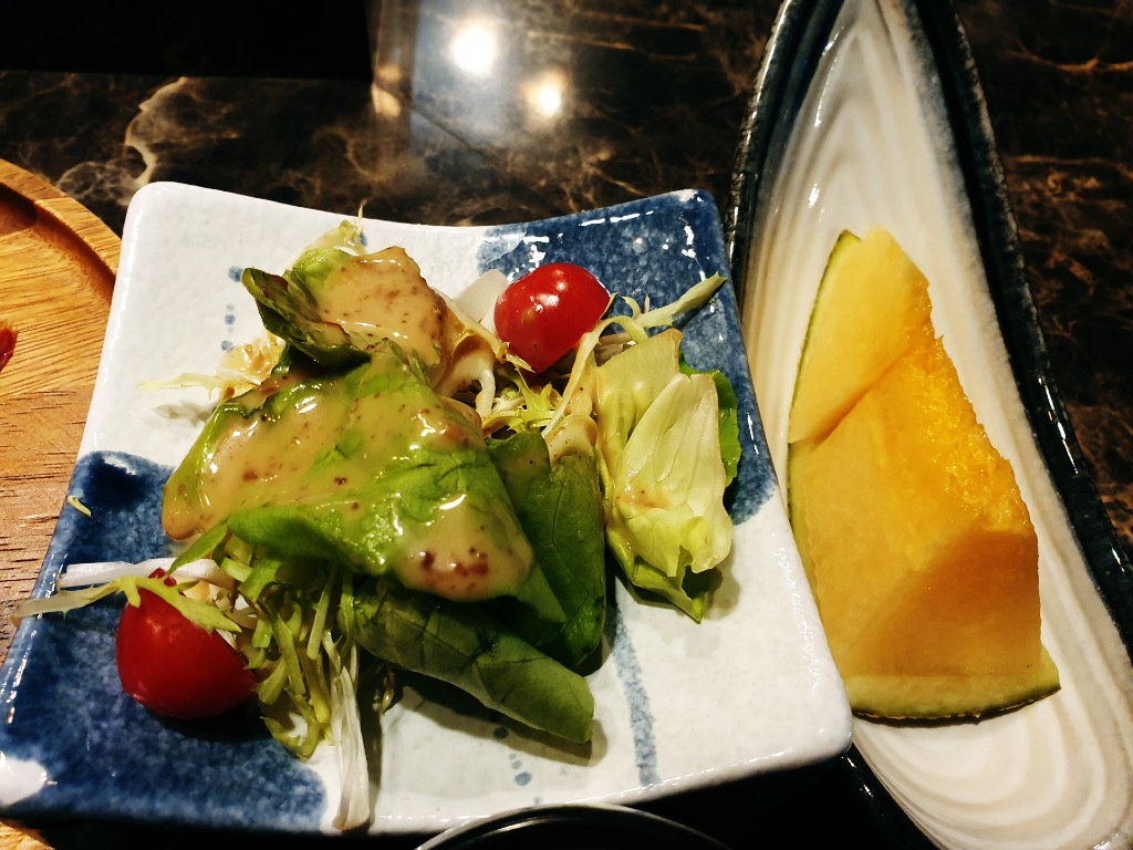 Salad and melon