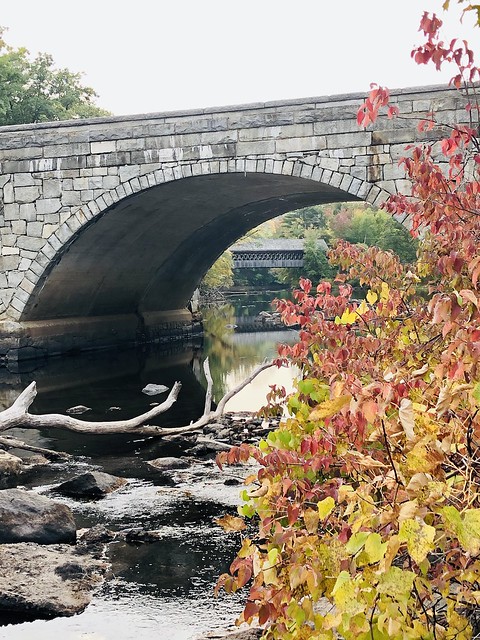 Henniker Covered Bridge through Stone Arch Bridge. Henniker, New Hampshire. Spanning Contoocook River. Paul Chandler September 2020.