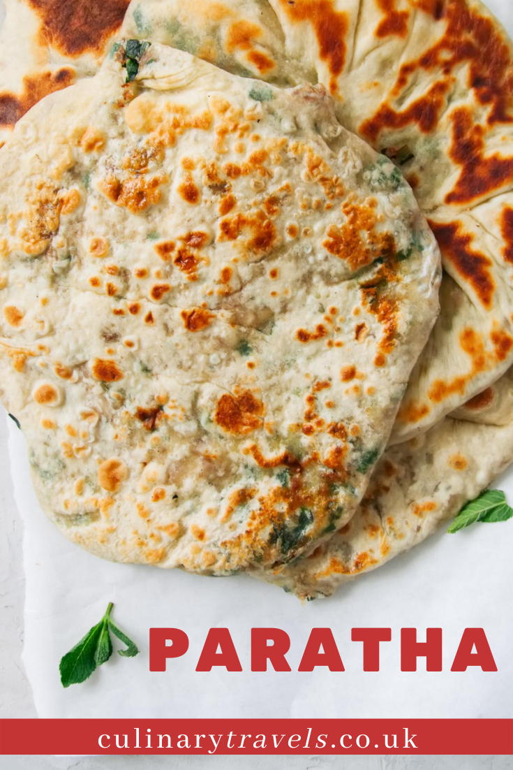Soft and flaky parathas (flat bread) with lots of layers. This is a Pakistani style paratha which is more on the soft, flaky side. Utterly moreish.