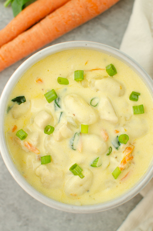 Creamy Chicken Gnocchi Soup - quick and easy dinner the whole family will love! Creamy soup filled with chicken, potato gnocchi, carrots, and spinach.