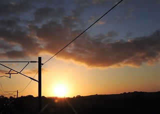 Sunset and Silhouetted Masts