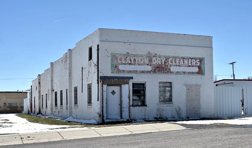 usa newmexico clayton claytondrycleaners abandoned architecture facade smalltown cleaners urban permanentlyclosed ghostsign sign snow drycleaning laundry independentbusiness freepickup freedelivery tailors