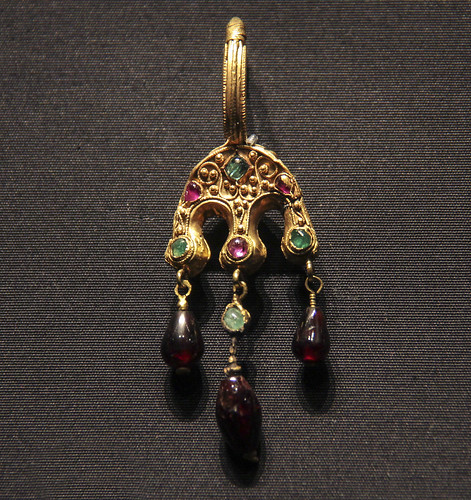 Earring, Lombard Kingdom, about 500-700, the stones a later replacement, Gold, rubies, emeralds and garnets