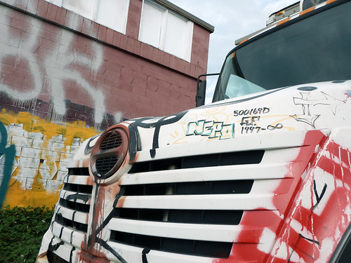 Graffiti 'clouded over' on a truck parked in Vancouver's Eastside