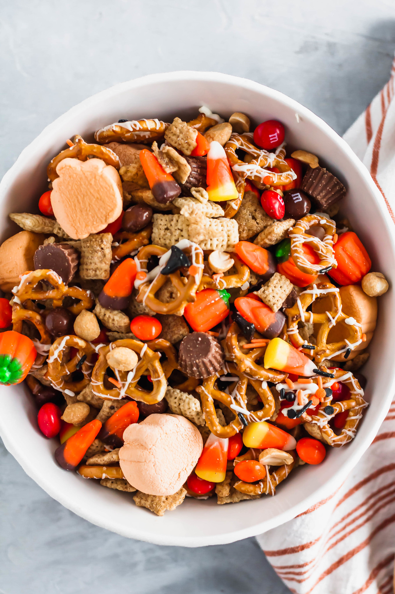 Need a fun snack for October? This Halloween Snack Mix is the perfect combination of sweet and salty ingredients and will be a huge hit with your family.