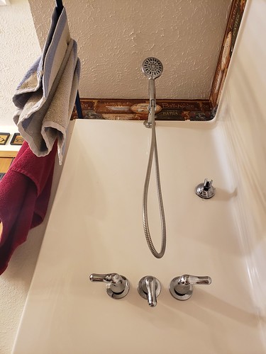 2020 indoor shower bath bathroom room showerhead handles lookingup view towel towels