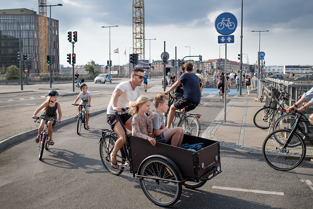 Cool dad on bike with 4 kids, Copenhagen, Denmark