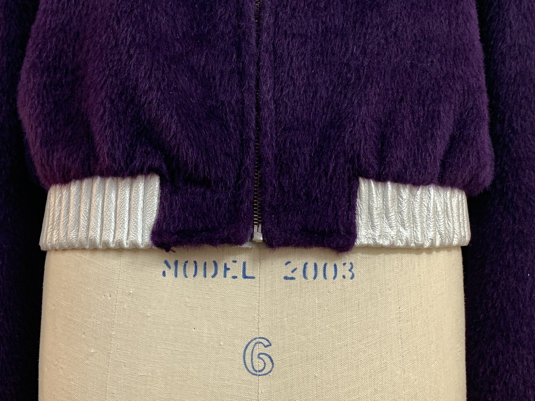 Purple mohair bomber with silver leather accents