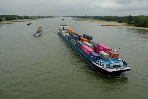 barge ship boat holland nederland netherlands transportation schepen fujifilm water waal travel travelling river moving fujinon