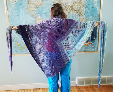 Nikki’s Find Your Fade Shawl by Sndrea Mowry is stunning! Yarn includes Hedgehog Sock in Velvet and Monet!
