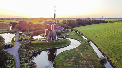 holland flight sunrise mill architecture water
