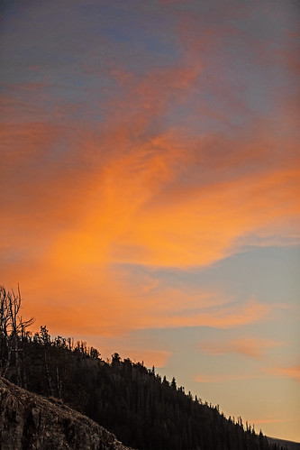 montana beartoothmountains rockcreekvista redlodge carboncounty custernationalforest beartoothhighway sunset clouds color orange trees