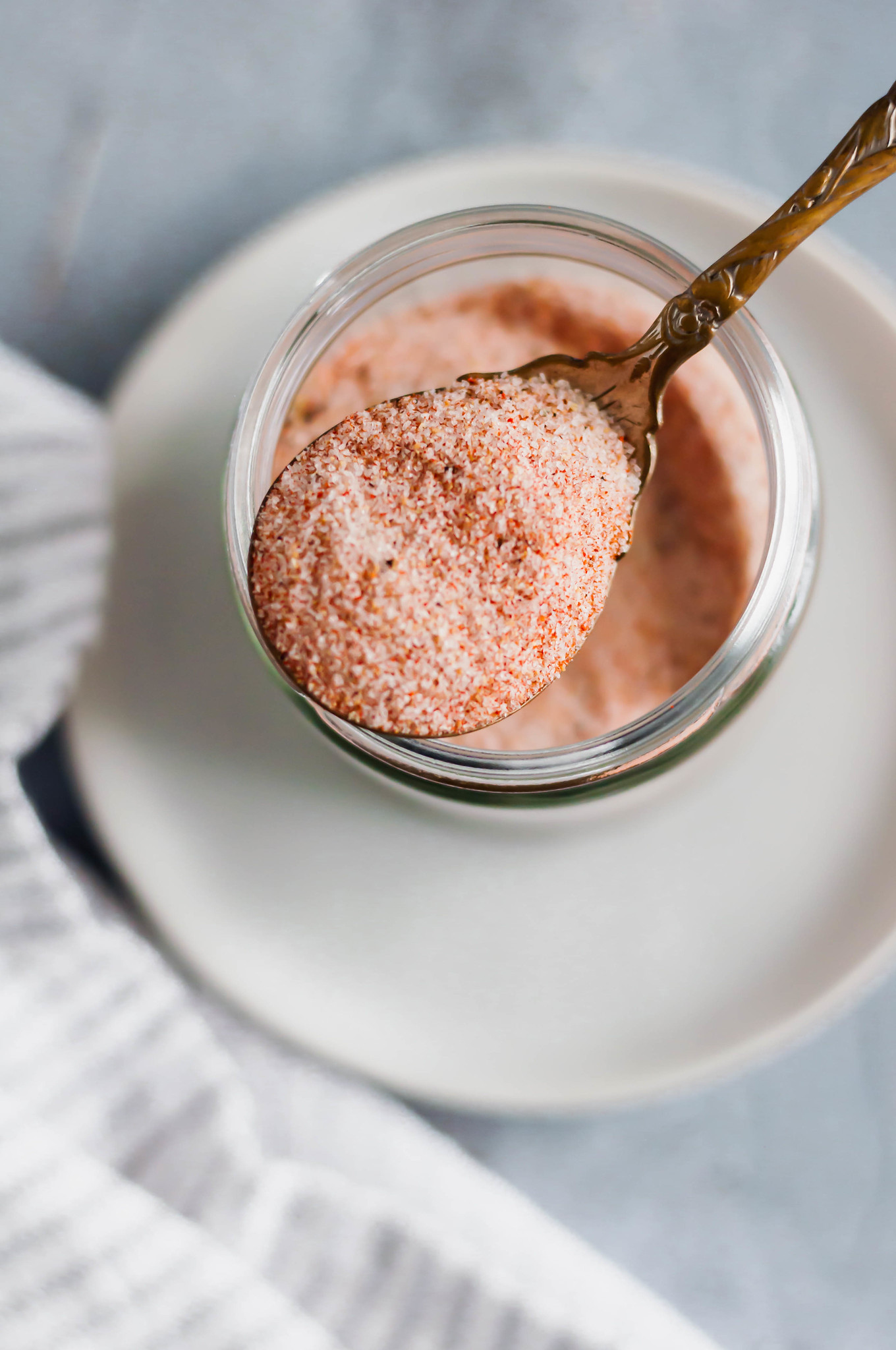 Skip the store-bought stuff and make your own Homemade Seasoned Salt. Mix it up in minutes with ingredients already in your cabinet. 