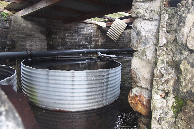 Water tanks inside the ruined farm at Torcuileainn