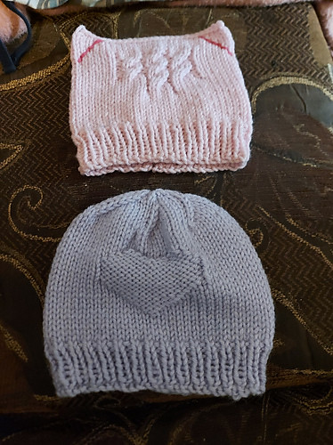 Two baby hats for Sophia knit by Mary Ellen(MadCrocheter). Pattern is Soft Kitty Cat Ears Hat by Patternery.