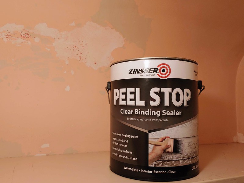 Painting the Den: After a preliminary scraping of the closet walls, a coat Peel Stop to prevent further peeling prior to painting