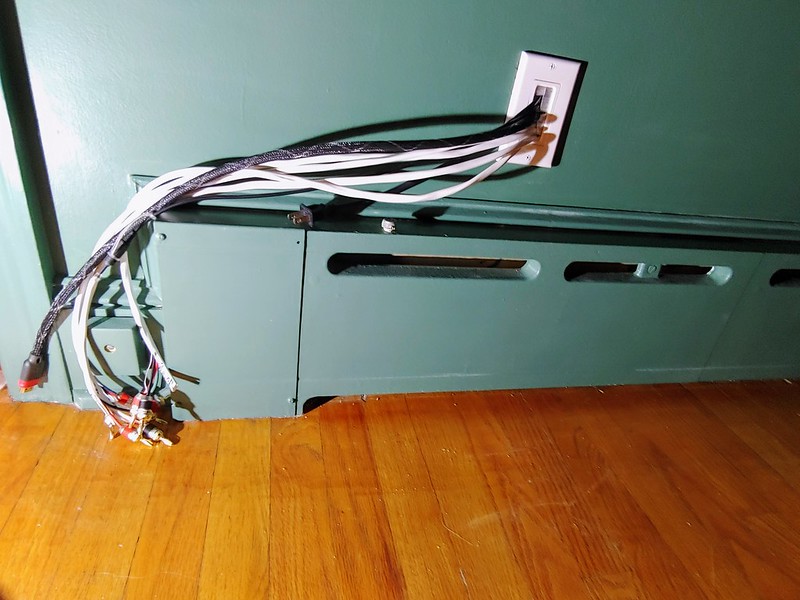 Painting the Den: (7) Hidden cable management that comes out from the basement