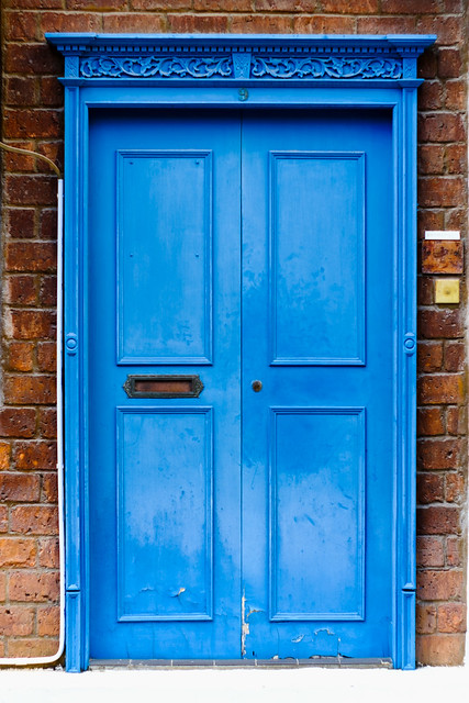 A stylish blue door that has survived modernisation.