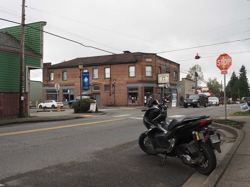 ADV 150 in Granite Falls: When I was taking photos around town, a local asked me if that's what I was doing and starting telling me about some of the buildings there.  <a href="https://cobaltcycles.com/" rel="noreferrer nofollow">Cobalt Cycles</a> used to be a bar, and the Mexican restaurant next door used to have a dance hall behind it, which has since been demolished.