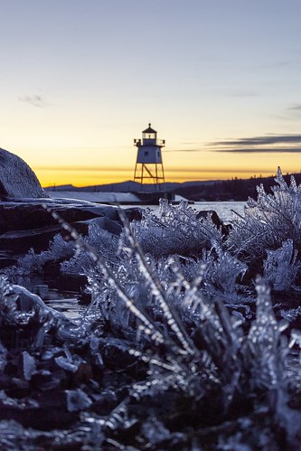 winter lighthouse ice icy sunset grandmarais minnesota northshore